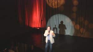 American clean corporate stand-up comedian Shaun Eli on stage at South Africa's Cape Town Comedy Club