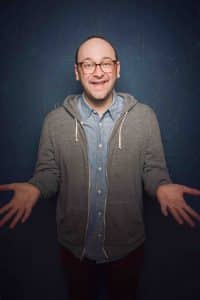 Book clean comic Josh Gondelman for your corporate event (headshot of the comedian)